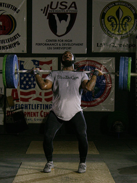 Kendrick Farris lifting weights